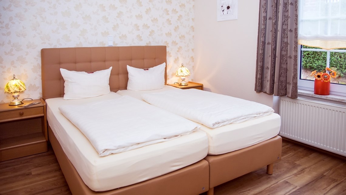 Hotelzumschwan Zimmer Gästehaus 2